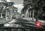 Image of car on a road Miami Florida USA, 1936, second 44 stock footage video 65675031913