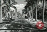 Image of car on a road Miami Florida USA, 1936, second 47 stock footage video 65675031913