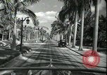 Image of car on a road Miami Florida USA, 1936, second 48 stock footage video 65675031913