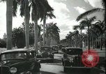 Image of car on a road Miami Florida USA, 1936, second 50 stock footage video 65675031913
