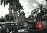 Image of car on a road Miami Florida USA, 1936, second 51 stock footage video 65675031913