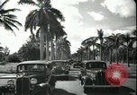 Image of car on a road Miami Florida USA, 1936, second 53 stock footage video 65675031913