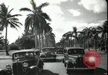 Image of car on a road Miami Florida USA, 1936, second 54 stock footage video 65675031913
