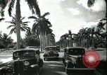 Image of car on a road Miami Florida USA, 1936, second 56 stock footage video 65675031913