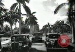 Image of car on a road Miami Florida USA, 1936, second 57 stock footage video 65675031913