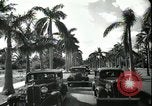 Image of car on a road Miami Florida USA, 1936, second 58 stock footage video 65675031913
