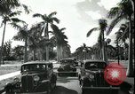 Image of car on a road Miami Florida USA, 1936, second 59 stock footage video 65675031913