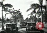 Image of car on a road Miami Florida USA, 1936, second 61 stock footage video 65675031913