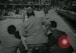 Image of 1930s tourists in swim suits West Palm Beach Florida USA, 1936, second 9 stock footage video 65675031920