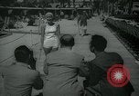 Image of 1930s tourists in swim suits West Palm Beach Florida USA, 1936, second 10 stock footage video 65675031920