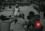 Image of 1930s tourists in swim suits West Palm Beach Florida USA, 1936, second 22 stock footage video 65675031920