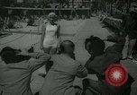 Image of 1930s tourists in swim suits West Palm Beach Florida USA, 1936, second 23 stock footage video 65675031920