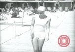 Image of 1930s tourists in swim suits West Palm Beach Florida USA, 1936, second 31 stock footage video 65675031920