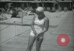 Image of 1930s tourists in swim suits West Palm Beach Florida USA, 1936, second 32 stock footage video 65675031920