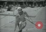 Image of 1930s tourists in swim suits West Palm Beach Florida USA, 1936, second 33 stock footage video 65675031920