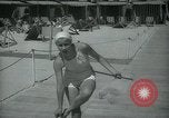 Image of 1930s tourists in swim suits West Palm Beach Florida USA, 1936, second 34 stock footage video 65675031920