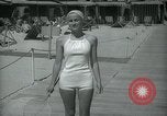 Image of 1930s tourists in swim suits West Palm Beach Florida USA, 1936, second 37 stock footage video 65675031920