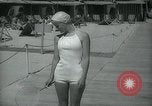 Image of 1930s tourists in swim suits West Palm Beach Florida USA, 1936, second 42 stock footage video 65675031920