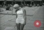 Image of 1930s tourists in swim suits West Palm Beach Florida USA, 1936, second 43 stock footage video 65675031920