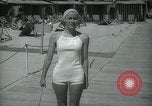 Image of 1930s tourists in swim suits West Palm Beach Florida USA, 1936, second 44 stock footage video 65675031920