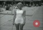 Image of 1930s tourists in swim suits West Palm Beach Florida USA, 1936, second 45 stock footage video 65675031920