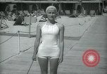 Image of 1930s tourists in swim suits West Palm Beach Florida USA, 1936, second 46 stock footage video 65675031920