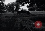 Image of camping in car United States USA, 1920, second 5 stock footage video 65675031931