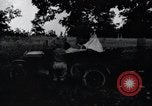 Image of camping in car United States USA, 1920, second 18 stock footage video 65675031931