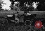 Image of camping in car United States USA, 1920, second 19 stock footage video 65675031931