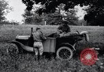 Image of camping in car United States USA, 1920, second 22 stock footage video 65675031931