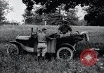 Image of camping in car United States USA, 1920, second 23 stock footage video 65675031931