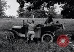 Image of camping in car United States USA, 1920, second 24 stock footage video 65675031931
