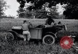 Image of camping in car United States USA, 1920, second 25 stock footage video 65675031931