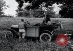 Image of camping in car United States USA, 1920, second 27 stock footage video 65675031931