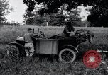Image of camping in car United States USA, 1920, second 28 stock footage video 65675031931