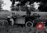Image of camping in car United States USA, 1920, second 29 stock footage video 65675031931