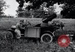 Image of camping in car United States USA, 1920, second 30 stock footage video 65675031931