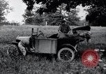 Image of camping in car United States USA, 1920, second 32 stock footage video 65675031931