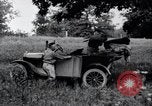 Image of camping in car United States USA, 1920, second 33 stock footage video 65675031931