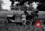 Image of camping in car United States USA, 1920, second 35 stock footage video 65675031931