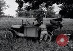 Image of camping in car United States USA, 1920, second 37 stock footage video 65675031931