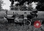 Image of camping in car United States USA, 1920, second 42 stock footage video 65675031931