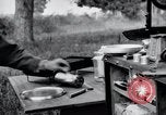 Image of camping in car United States USA, 1920, second 52 stock footage video 65675031931