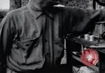 Image of camping in car United States USA, 1920, second 53 stock footage video 65675031931