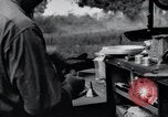 Image of camping in car United States USA, 1920, second 54 stock footage video 65675031931