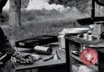 Image of camping in car United States USA, 1920, second 56 stock footage video 65675031931