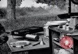 Image of camping in car United States USA, 1920, second 57 stock footage video 65675031931