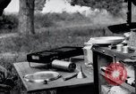 Image of camping in car United States USA, 1920, second 59 stock footage video 65675031931