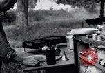Image of camping in car United States USA, 1920, second 60 stock footage video 65675031931