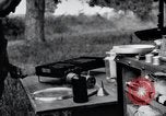 Image of camping in car United States USA, 1920, second 62 stock footage video 65675031931